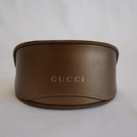 Custodia e occhiali Gucci